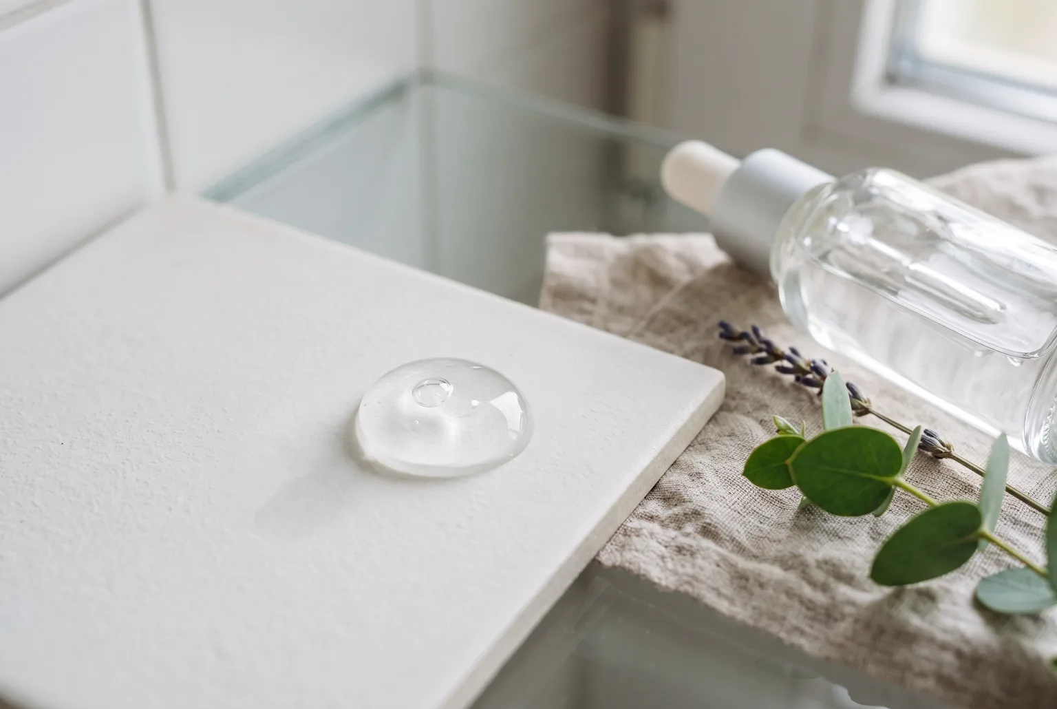 Close-up of clear gel texture on porcelain
