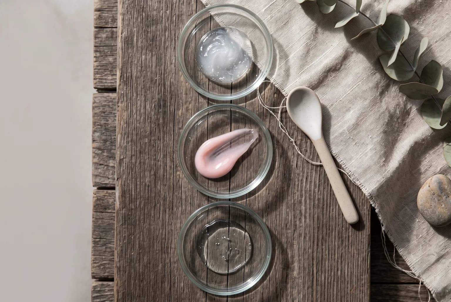 Three dishes showing serum textures: gel, viscous pink streak, thin liquid