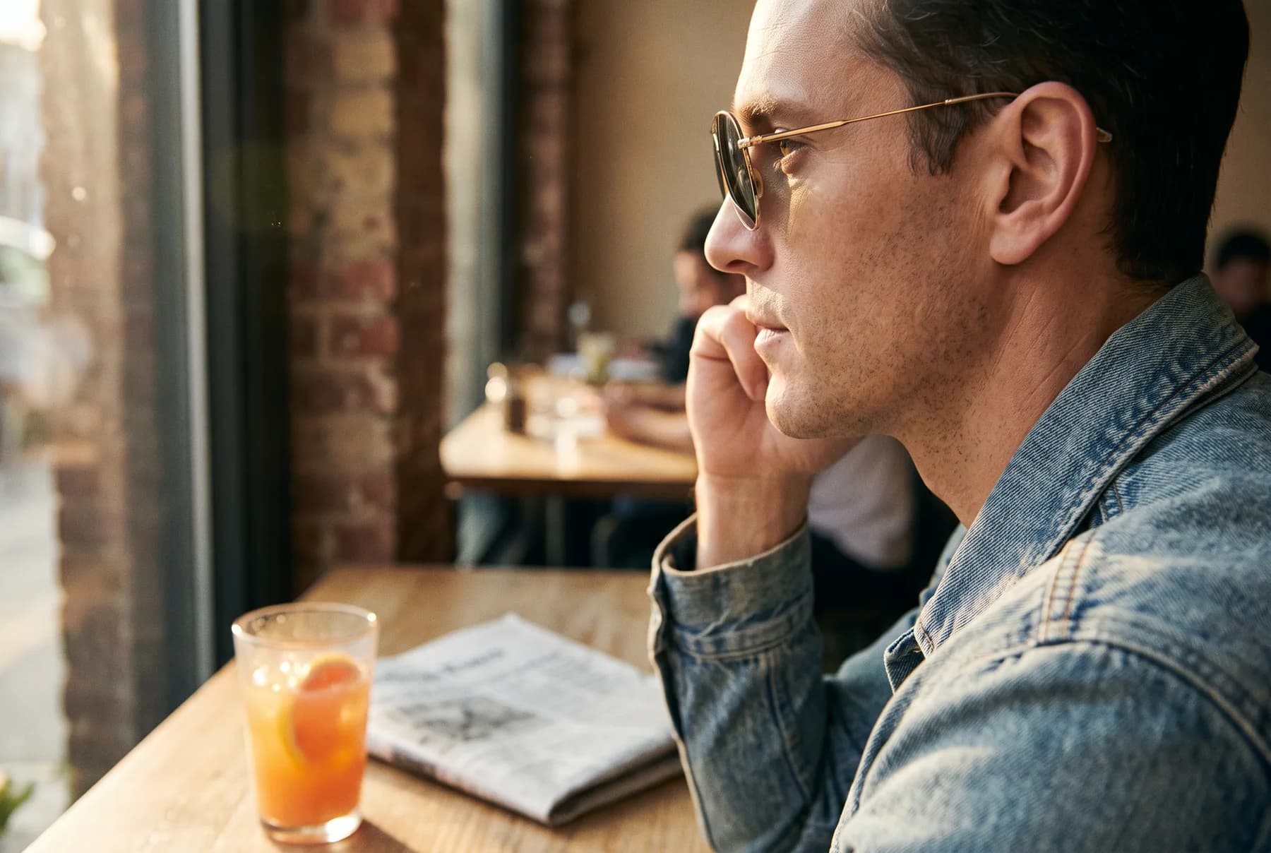 Person wearing aviator sunglasses with a balanced fit across the temples
